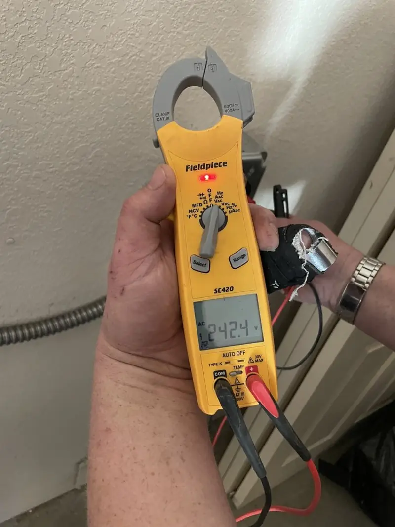 Voltage testing with clamp meter during Generator Installation in Northlake